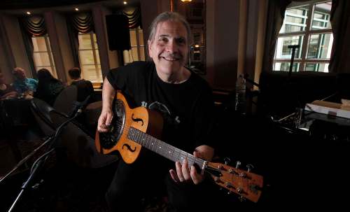 PHIL HOSSACK / WINNIPEG FREE PRESS
Laurie MacKenzie warms up while setting up for a gig at the Fort Garry Hotel's Palm Room.