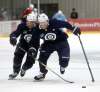 PHIL HOSSACK / WINNIPEG FREE PRESS
Winnipeg Jets Matt Hendricks and Joel Armia (right) jostle for the puck Saturday at the Iceplex.