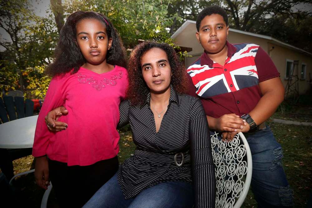 JOHN WOODS / WINNIPEG FREE PRESS FILES
Saba Temnewo (middle) had her spot in an English class cut, but she has received good news — there is room after all.