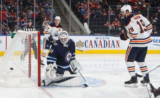 JASON FRANSON / THE CANADIAN PRESSWinnipeg Jets' goalie Michael Hutchinson (34) makes the save on Edmonton Oilers' Patrick Maroon (19) during second period pre-season NHL action in Edmonton, Alta., on Saturday September 23, 2017.