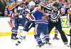 THE CANADIAN PRESS/Jason Franson
Winnipeg Jets' Dustin Byfuglien fights then- Edmonton Oilers' Matt Hendricks during a game in February, 2016. With no designated team fighter, the two players (now Jets teammates) may be called upon more often to stand up for other Jets' players by fighting – just not with eachother.