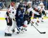 THE CANADIAN PRESS/John Woods
Winnipeg Jets' Mathieu Perreault attempts to get between Ottawa Senators goaltender Mike Condon and defenceman Fredrik Claesson during second period NHL pre-season game action in Winnipeg on Wednesday.