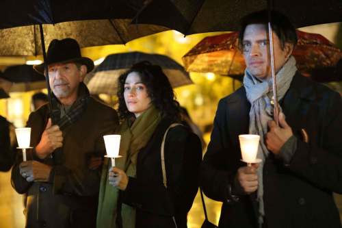 Bell Media
Henry Sullivan (Peter Coyote, left) and his children, Catherine and Luke (Joanne Kelly, Aden Young), attend a vigil for Luke&rsquo;s missing son Anthony in the première of The Disappearance.