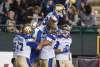 Jason Franson / The Canadian Press
Winnipeg Blue Bombers players celebrate a touchdown against the Edmonton Eskimos in Edmonton on Saturday.