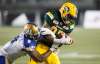 JASON FRANSON / THE CANADIAN PRESS
Winnipeg Blue Bombers' Chris Randle (8) tackles Edmonton Eskimos' Derel Walker (87) during second half CFL action in Edmonton, Alta., on Saturday September 30, 2017.