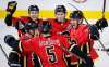 JEFF MCINTOSH / THE CANADIAN PRESS
Calgary Flames' Micheal Ferland, right, celebrates his goal with teammates during second period NHL hockey action against the Winnipeg Jets in Calgary, Saturday, Oct. 7, 2017.