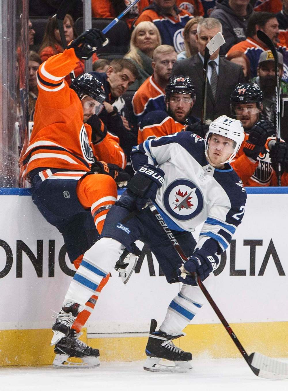 JASON FRANSON / THE CANADIAN PRESS
Winnipeg Jets' Nikolaj Ehlers (27) checks Edmonton Oilers' Kris Russell (4) during the first period Monday.
