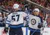 JASON FRANSON / THE CANADIAN PRESS
Winnipeg Jets' Tyler Myers (57) and Dmitry Kulikov (5) celebrate a goal against the Edmonton Oilers during the first period in Edmonton Monday.
