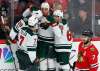 Jim Young / The Associated Press
Minnesota Wild's Chris Stewart, centre, celebrates his goal against the Chicago Blackhawks last Thursday.