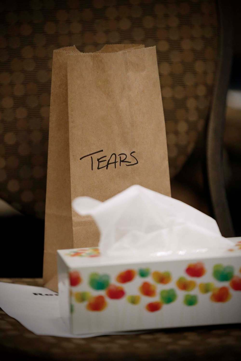 John Woods / The Canadian Press
A bag for tear-soaked tissues sits on a chair reserved for family as the family of Nicole Daniels speaks to commissioner Michelle Audette at the opening day of hearings at the National Inquiry into Missing and Murdered Indigenous Women and Girls