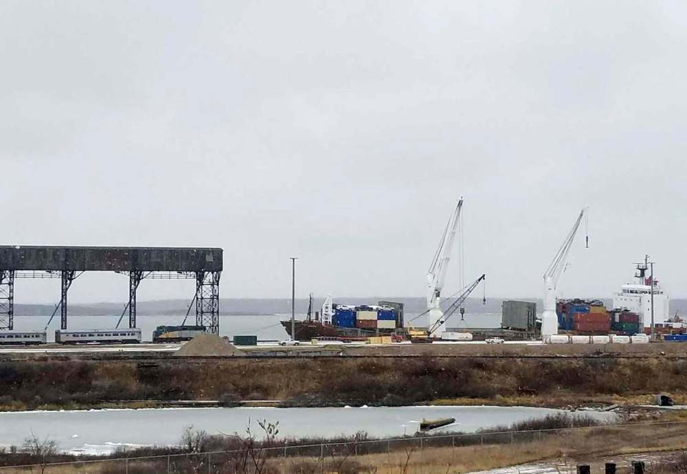 Katie de Muelles / Winnipeg Free Press
Via Train rail cars sit at the Port of Churchill on Monday, next to the MV Nunalik, which will bring them to Montreal. The ship needs to first unload its shipment of 2.2 million litres of propane and equipment.