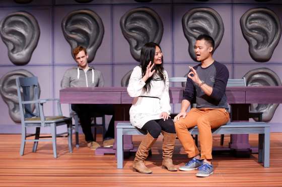 JOHN WOODS / WINNIPEG FREE PRESSStephanie Sy assists Jordan Sangalang with his sign language as Ryan James Miller looks on at Winnipeg Jewish Theatre’s production of Tribes.