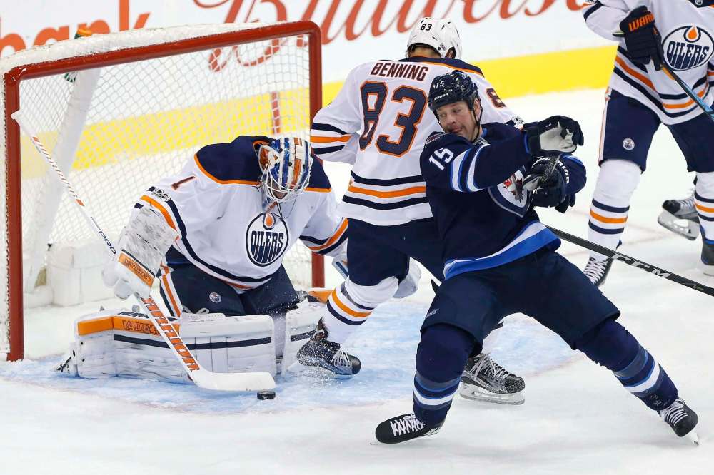 THE CANADIAN PRESS/John Woods
Winnipeg Jets' Matt Hendricks in an NHL pre-season game against the Edmonton Oilers in September. Hendricks appears ready to return to action in Thursday’s game against Pittsburgh.