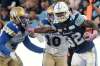THE CANADIAN PRESS/Nathan Denette
Argonauts running back James Wilder Jr. breaks a tackle against Bombers linebackers Jovan Santos-Knox, left, and Sam Hurl in Winnipeg's loss to Toronto last Saturday.