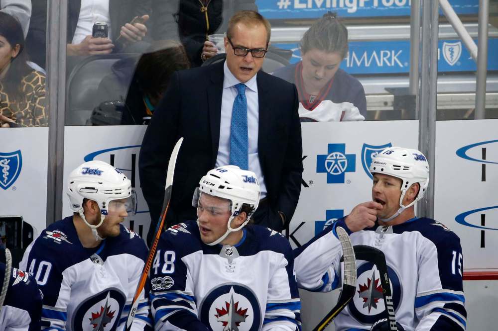 GENE J. PUSKAR / THE ASSOCIATED PRESS
Head coach Paul Maurice talks with Matt Hendricks (right) on the bench during the first period against the Penguins.