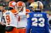 B.C. Lions’ Alex Ross (left) and Ty Long celebrate a field goal by Long as Bombers T.J. Heath