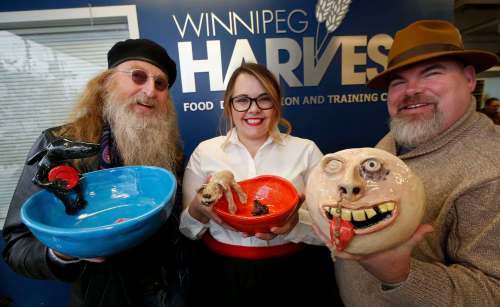 WAYNE GLOWACKI / WINNIPEG FREE PRESS
From left: Artist Jordan Van Sewell; Sarah Henry, Winnipeg Harvest&rsquo;s development associate, signature events; and comedian Big Daddy Tazz with bowls that will be auctioned off today at the Empty Bowls Soup-er Lunch.