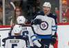 Jim Mone / The Associated Press Files
The Jets’ Kyle Connor (right) has been productive on the top line this season, filling in for the injured Mathieu Perreault.