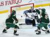 Jeff Wheeler/Minneapolis Star Tribune
Winnipeg goalie Connor Hellebuyck keeps his eye on the puck late in the third period of the Jets' 2-1 victory over the Wild on Tuesday, in St. Paul, Minn.