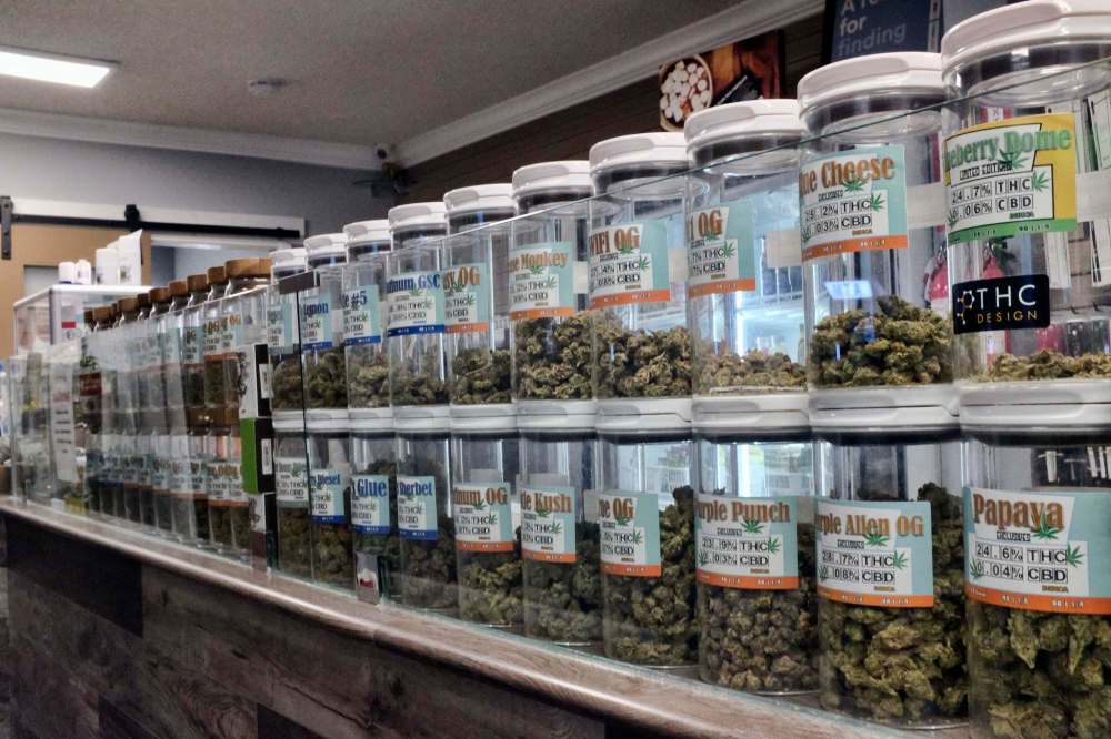 Jars of medical marijuana on display on the counter of a marijuana dispensary in California. Manitoba municipalities will be able to restrict or prohibit the sale of marijuana, provincial officials say.  (Richard Vogel / The Associated Press files)