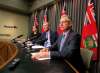 Attorney General Heather Stefanson (from left), Premier Brian Pallister, and Trade Minister Blaine Pedersen announce a hybrid model for distribution and retail sales of cannabis in Manitoba. (Boris Minkevich / Winnipeg Free Press)