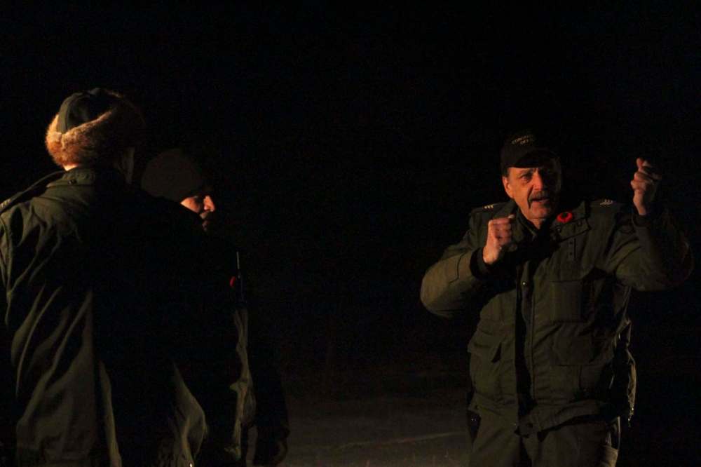 RYAN THORPE / WINNIPEG FREE PRESS
All photos taken during overnight operation targeting illegal night hunters. Location was Pearson area/southwestern Manitoba.
All people in photos are conservation officers.
(L) Gerry Rosset, (R) Chris Hrysak, as the operation wraps up.