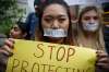 Dina Rudick / Boston Globe files
A student at the Berklee College of Music in Boston protests against sexual harassment.