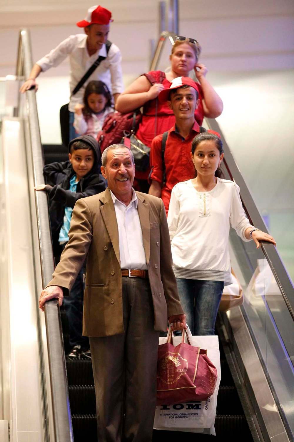 JOHN WOODS / WINNIPEG FREE PRESS
Khudher Naso and his family arrive at the Winnipeg airport in July 2016. His is one of several Yazidi families to have come to Canada from a refugee camp in Turkey.