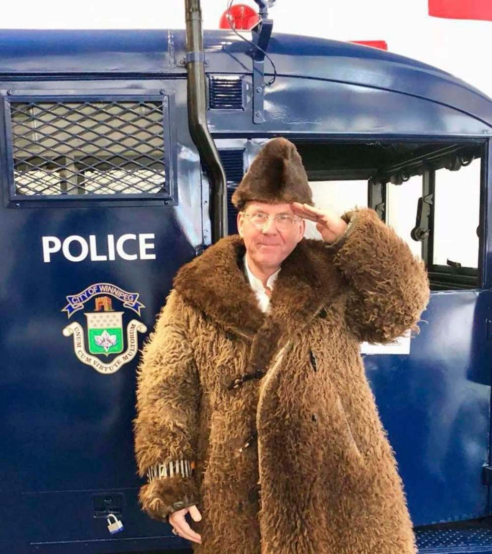 FACEBOOK
Winnipeg Police Board chairman David Asper, wearing the police museum’s retro buffalo coat.
