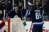Winnipeg Jets' Joel Armia (40) and Mathieu Perreault (85) celebrate Perreault's goal against the New Jersey Devils during the second period NHL action in Winnipeg on Saturday, November 18, 2017. THE CANADIAN PRESS/John Woods