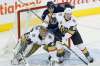THE CANADIAN PRESS/John Woods
Winnipeg Jets' Matt Hendricks attempts to get an opening against Las Vegas Golden Knights goalie Maxime Lagace and Nate Schmidt during first period in Winnipeg, Friday.