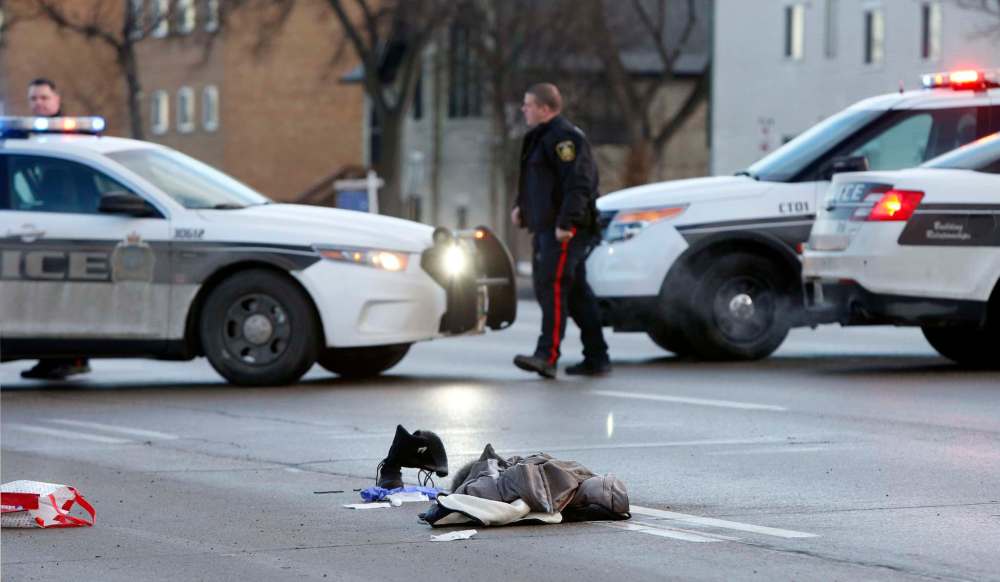 WAYNE GLOWACKI / WINNIPEG FREE PRESS
The woman was struck by a motorist on Main Street Friday morning.