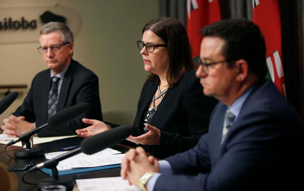 WAYNE GLOWACKI / WINNIPEG FREE PRESS
Justice Minister Heather Stefanson with at left, Blaine Pedersen, Growth, Enterprise and Trade Minister and Jeff Wharton, Municipal Relations Minister at the news conference in the Manitoba Legislative building Tuesday.