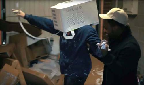 YouTube
Jay Swingler needed firefighters to remove a microwave that he cemented on his head. His pals spent about 90 minutes trying to pry him free before they called in the professionals.