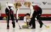 TREVOR HAGAN / WINNIPEG FREE PRESS FILES
Jill Officer watches her shot as Kaitlyn Lawes (left) and Dawn McEwen sweep in Portage la Prairie in October. Officer will join Winnipeg skip Reid Carruthers for another crack at the Olympics.