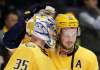 Nashville Predators center Ryan Johansen (92) congratulates goalie Pekka Rinne (35), of Finland, after the Predators beat the Chicago Blackhawks 3-2 in an NHL hockey game Tuesday, Nov. 28, 2017, in Nashville, Tenn. (AP Photo/Mark Humphrey)