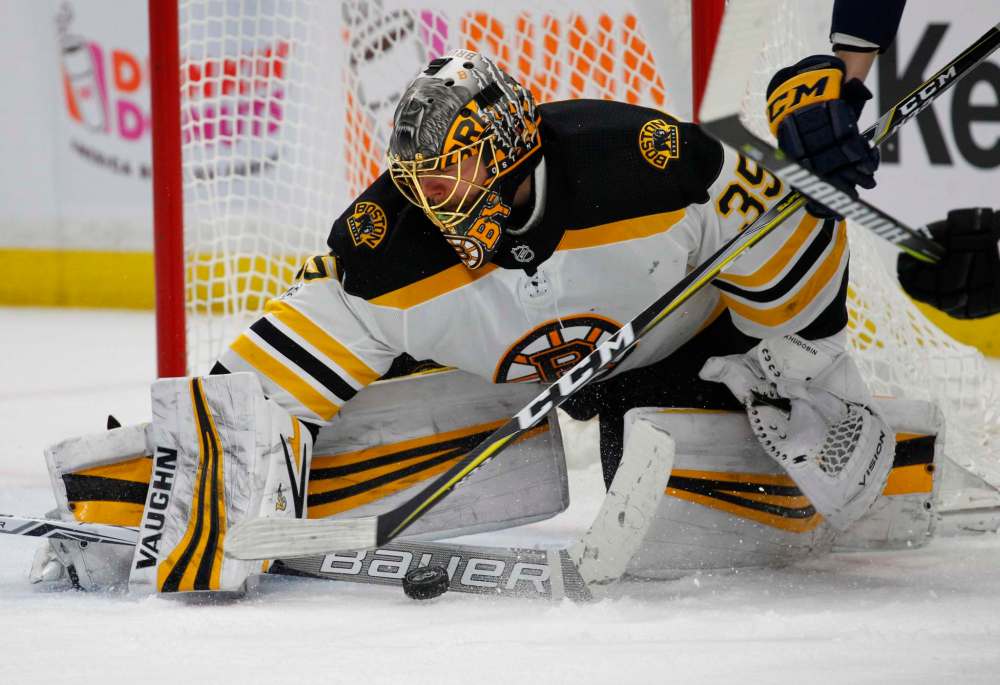 Jeffrey T. Barnes / The Associated Press
Boston Bruins goalie Anton Khudobin (35) makes a save game against the Buffalo Sabres on Tuesday in Buffalo, N.Y.