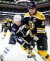 AP Photo/Michael Dwyer
Winnipeg Jets' Blake Wheeler and Boston Bruins' Zdeno Chara battle for the puck in NHL hockey game in Boston. Getting traded from the eventual Stanley Cup winnipeg Boston Bruins was a 