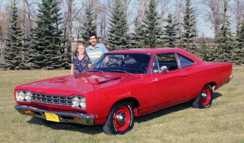 Photos by Larry D&rsquo;Argis / Winnipeg Free Press
Richard and Joanne Gregoire with their restored 1968 Plymouth Road Runner. Richard bought the car in 2012 and the overhaul was complete in the spring of 2014.