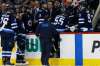 John Woods / The Canadian Press
Winnipeg Jets' Mark Scheifele (55) is assisted off the ice during the second period. The team's No. 1 centre will be out six to eight weeks with an upper body injury.