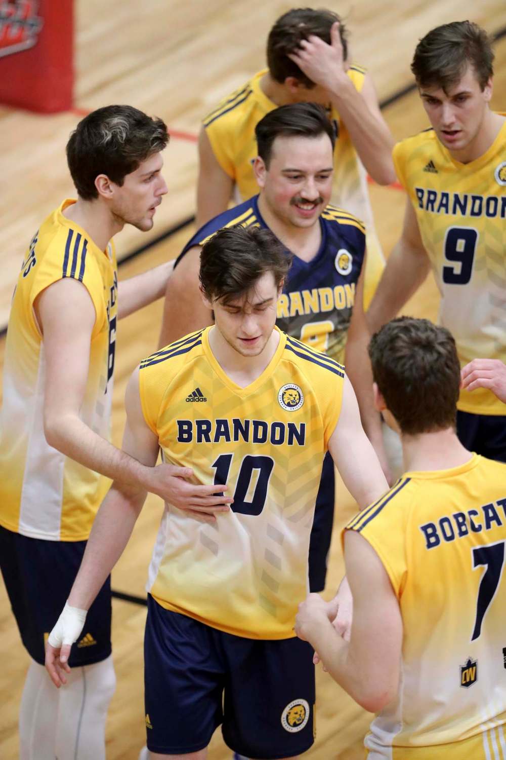 Brandon Bobcats celebrate after defeating the University of Winnipeg Wesmen at the Duckworth Centre Saturday.