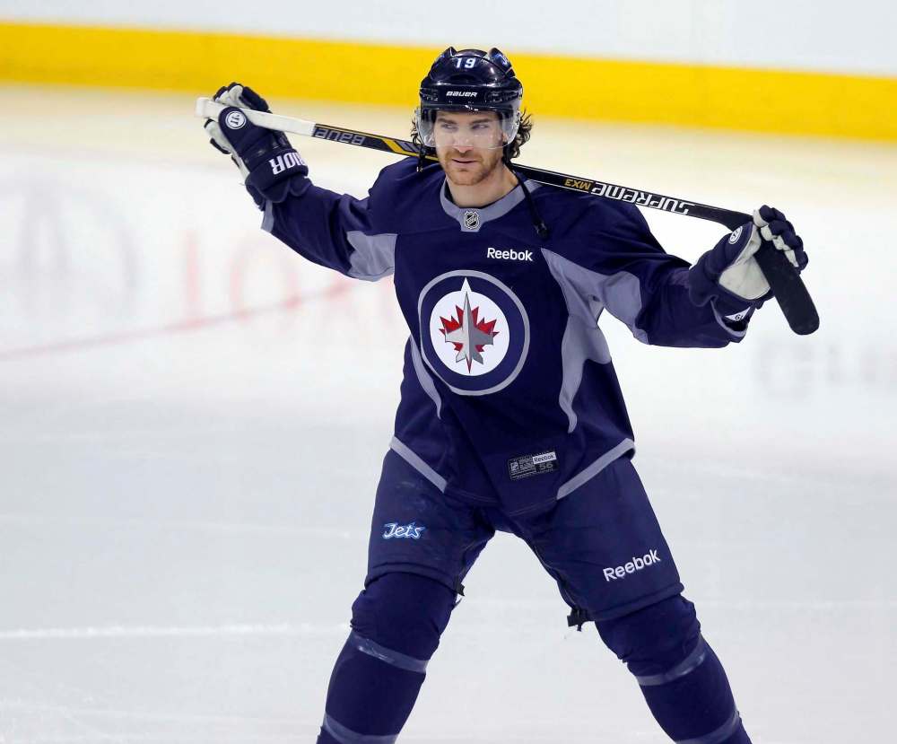 BORIS MINKEVICH / WINNIPEG FREE PRESS files
Jim Slater stretches at Jets practice in 2015.