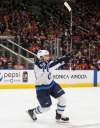 THE CANADIAN PRESS/Jason Franson
Winnipeg Jets' Marko Dano celebrates his first goal of the season during the first period against the Edmonton Oilers on Sunday.