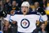 'It would be nice to play in front of the Finnish crowd:' Finnish sniper Patrik Laine said (AP Photo/Michael Dwyer)