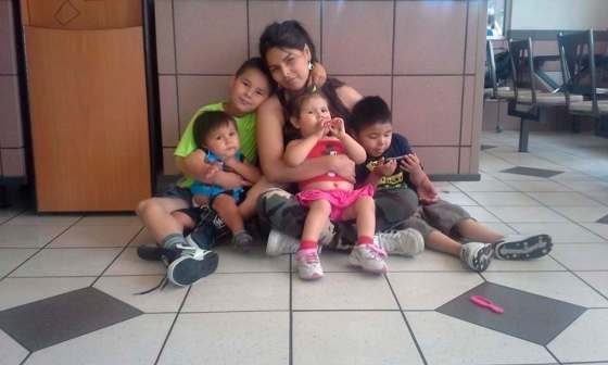THE CANADIAN PRESS/HOWindy Sinclair, 29, sits with her four children in an undated photo supplied by her family. Sinclair died after leaving a hospital and her family says she never should have been allowed to leave on her own.