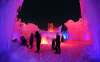 JASON HALSTEAD / WINNIPEG FREE PRESS
Visitors check out an ice fountain during a preview event of the Ice Castles attraction at Parks Canada Place at The Forks on Thursday evening. Ice Castles will open to the public on Friday.