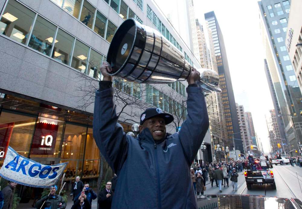 NATHAN DENETTE / THE CANADIAN PRESS FILES
Jordan Younger, then with the Toronto Argonauts, hoists the Grey Cup in 2012.