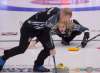 Curling Canada / michael burns photo
Winnipeg's Jennifer Jones, and playing partner Mark Nichols bring the stone into the house during the Canadian Mixed Doubles Olympic Curling Trials.