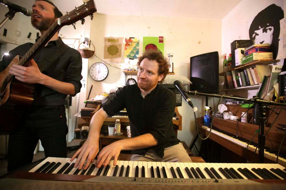 Tom Keenan (left) and Matt Peters worked for eight years on the latest Heavy Bell release. (Ruth Bonneville / Winnipeg Free Press)