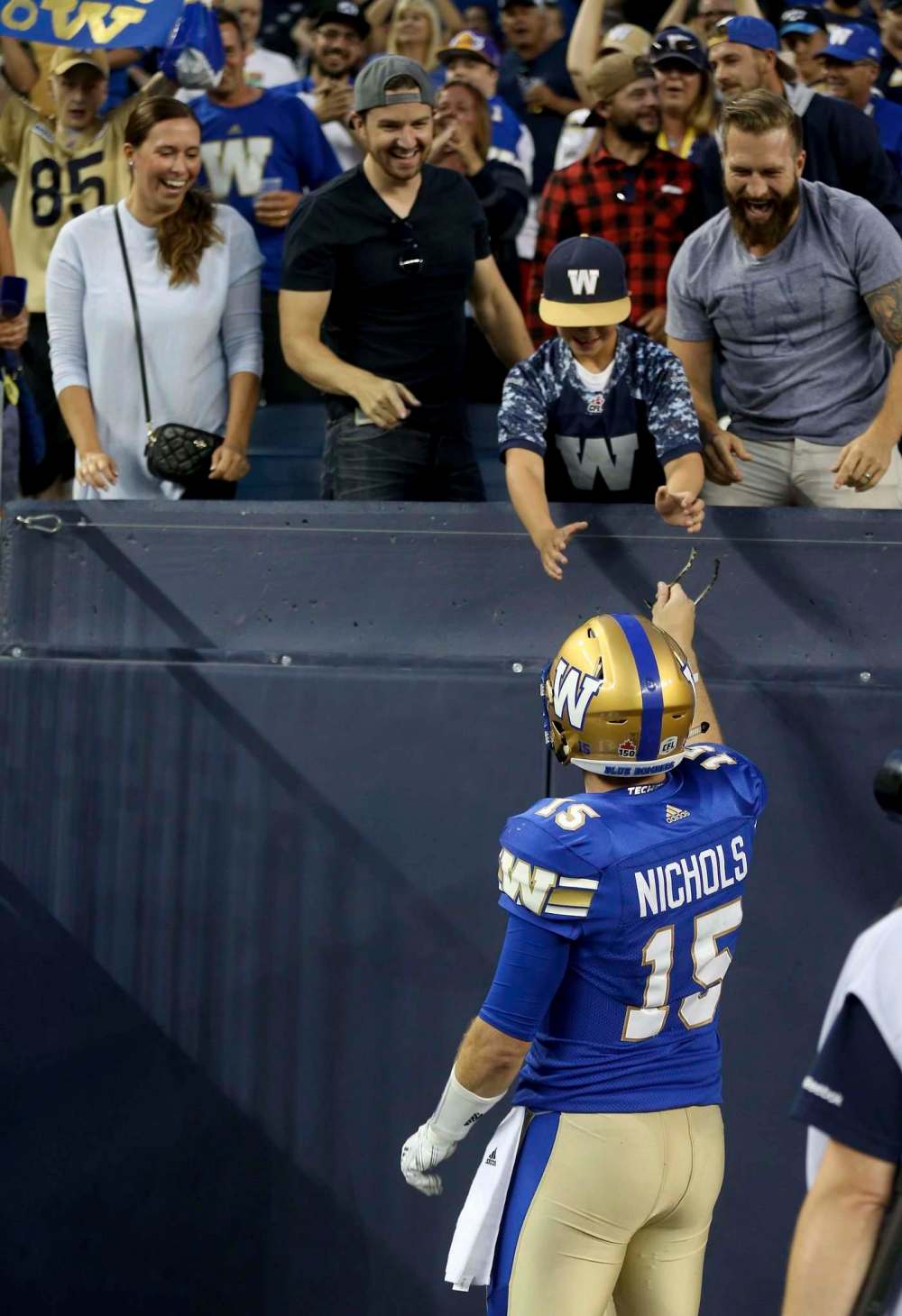 Trevor Hagan / The Canadian Press files
Bombers QB Matt Nichols interacts with fan.